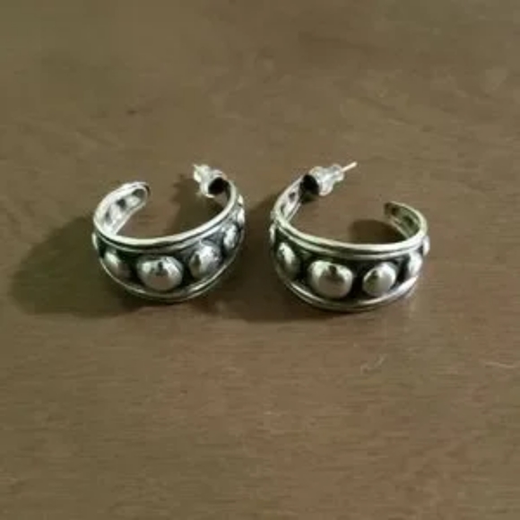 Unbranded Jewelry - Vintage Sterling silver hoop earrings with an ethnic flair